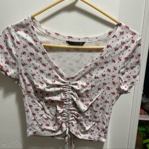 White with pinkish flower